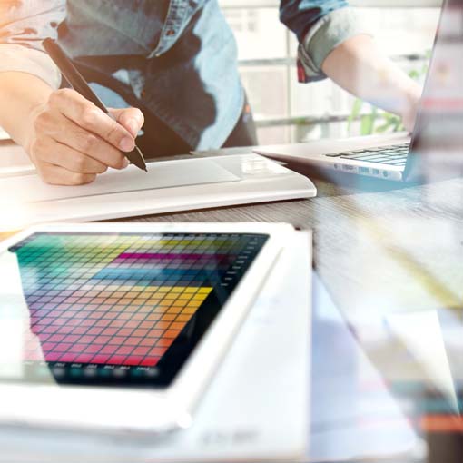 A designer working on a layout.