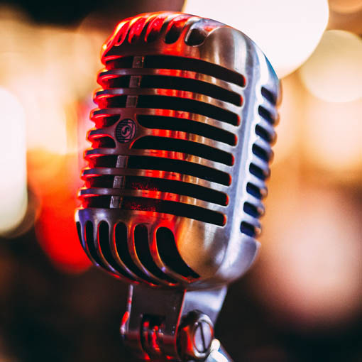 Close up of vintage chrome microphone.